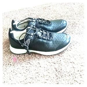 Pair of Earth Spirit sneakers